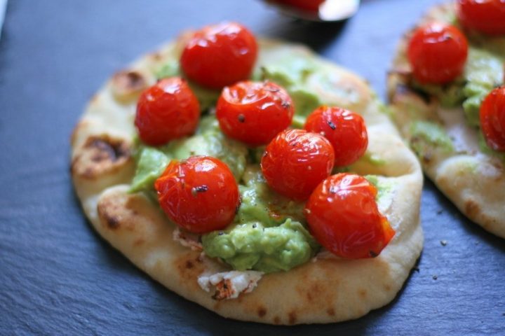 Roasted tomatoes, chunky avocado and goat cheese piled on warm naan makes a nice, light lunch or snack.