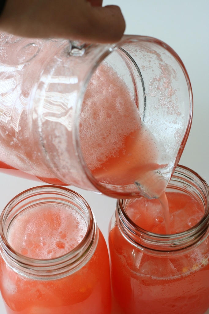 strawberry lemonade poured into 2 glasses