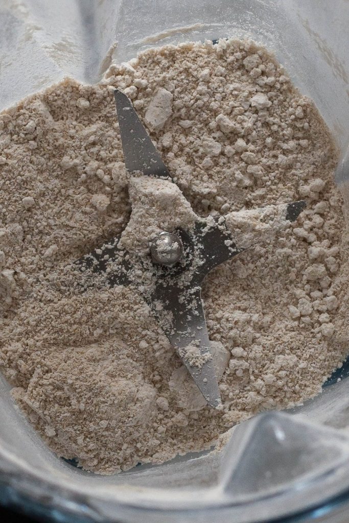 Oatmeal blended down into flour in a blender jar