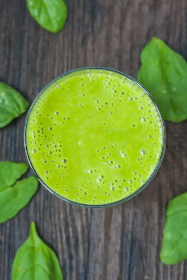 A delicious orange green smoothie can help you get back on track.