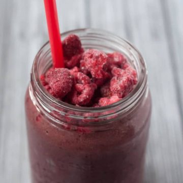 Berry Pineapple Peach Green Protein Smoothie - a great way to start your day off right. This recipe calls for plant protein powder so this is vegan/vegetarian friendly.