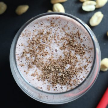 Strawberries, peanuts, oats and coconut/almond milk come together as a light, refreshing strawberry nut smoothie that is surprisingly filling.