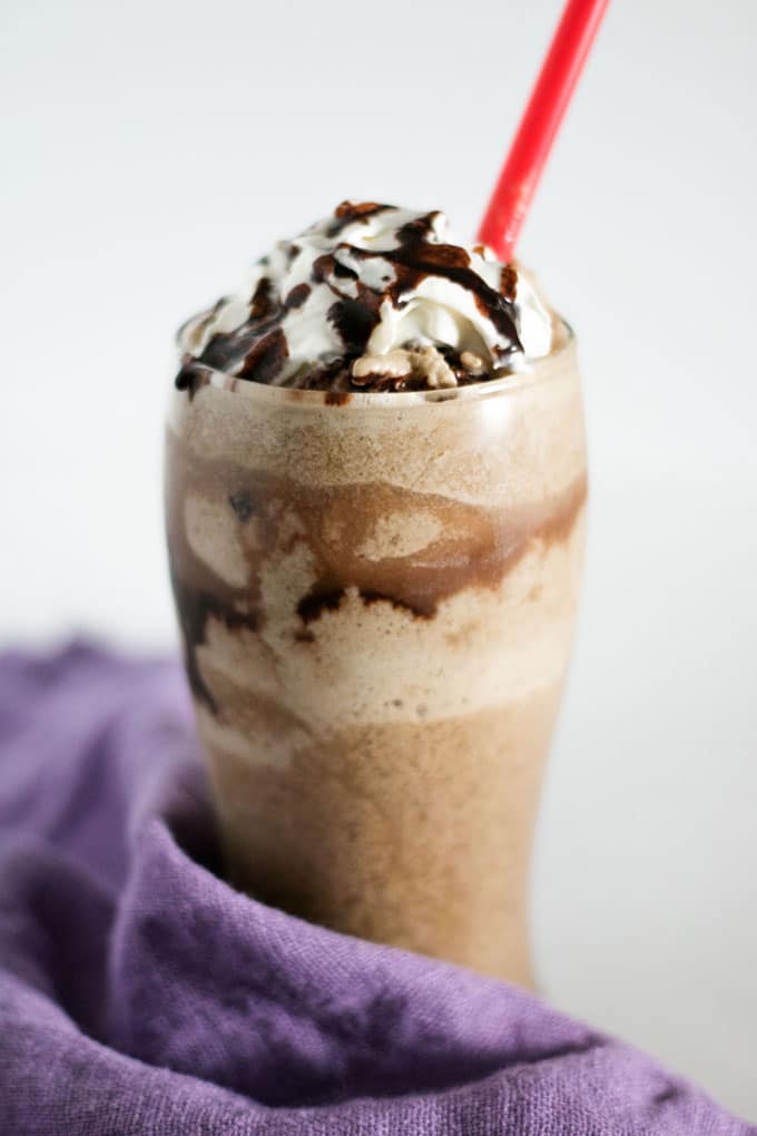 A chocolate peanut butter banana coffee smoothie is an easy to make, yet indulgent, treat perfect as a "pick me up".