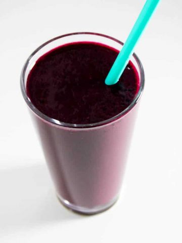 Purpose Smoothie in glass with straw
