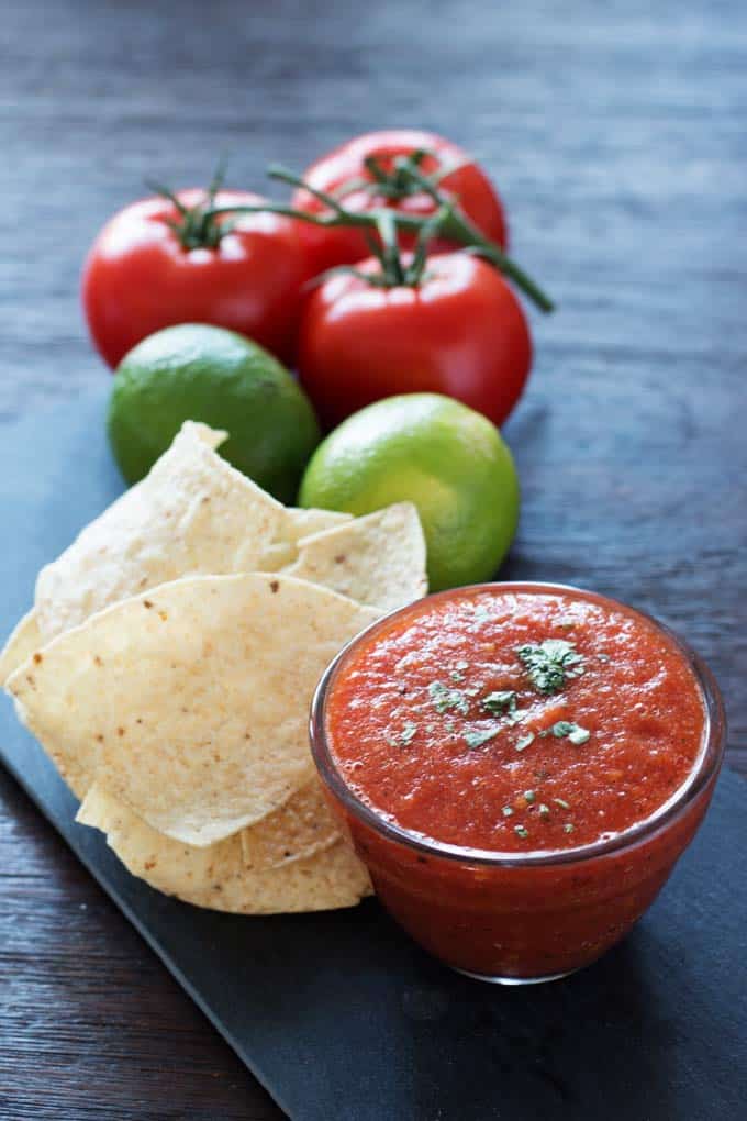 Easy roasted restaurant style salsa is quick and simple to make and has a nice surprising kick.