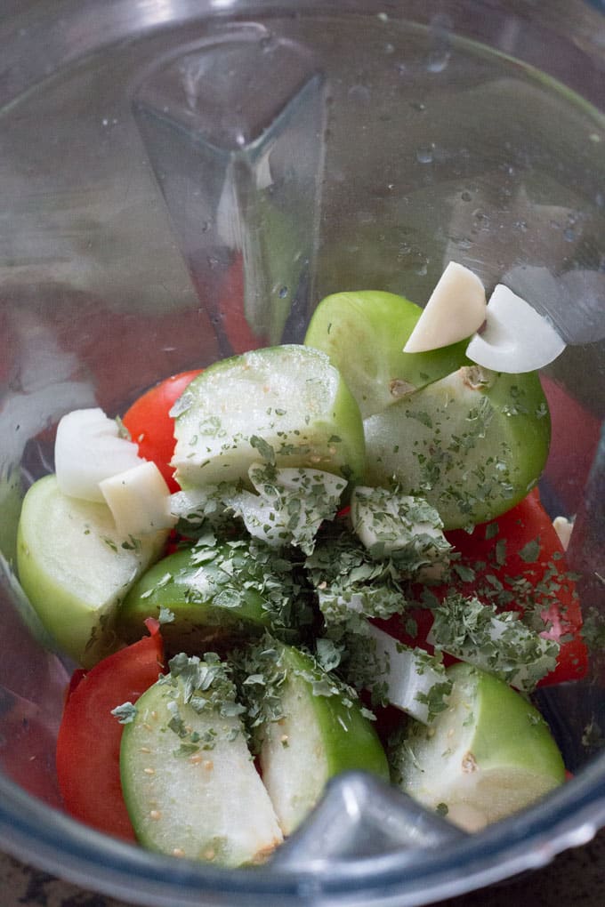 This raw, easy small batch tomatillo tomato salsa can be made in minutes with little fuss and almost no clean up.