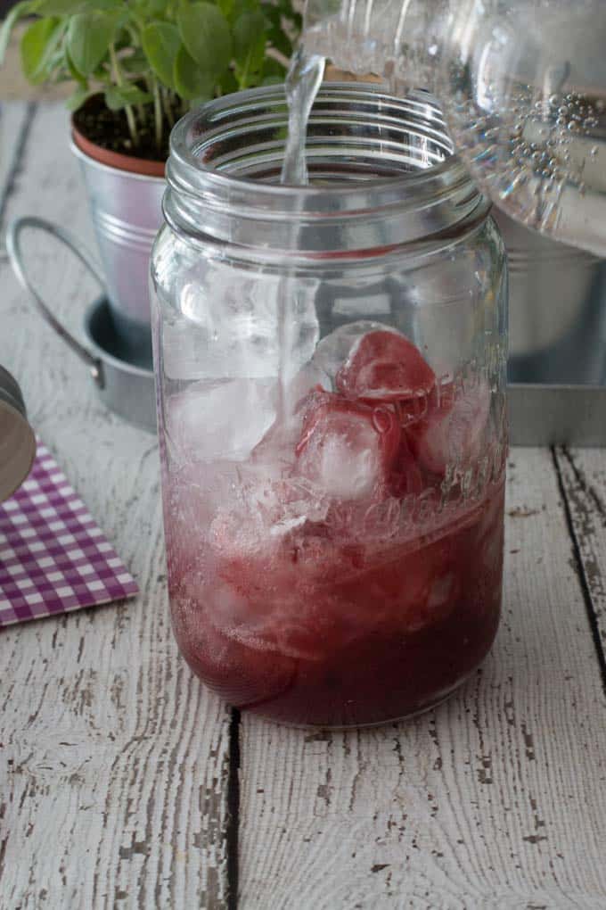 Tired of drinks that contain ingredients you can’t pronounce. Try this easy Sparkling Berry Soda that you can make in the comfort of your home.