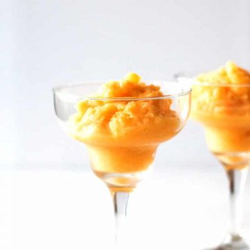 Pineapple Mango Spiced Rum Dessert Cocktail is the perfect summer time drink (or dessert). Can be enjoyed with a spoon or a straw - there are no rules.