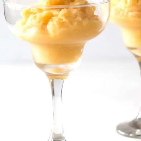 Pineapple Mango Spiced Rum Dessert Cocktail is the perfect summer time drink (or dessert). Can be enjoyed with a spoon or a straw - there are no rules.