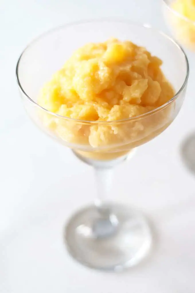 Pineapple Mango Spiced Rum Dessert Cocktail is the perfect summer time drink (or dessert). Can be enjoyed with a spoon or a straw - there are no rules.