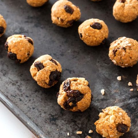 Easy to make vegan pumpkin raisin oatmeal protein bites. Omit the optional walnuts for the perfect lunch box addition.