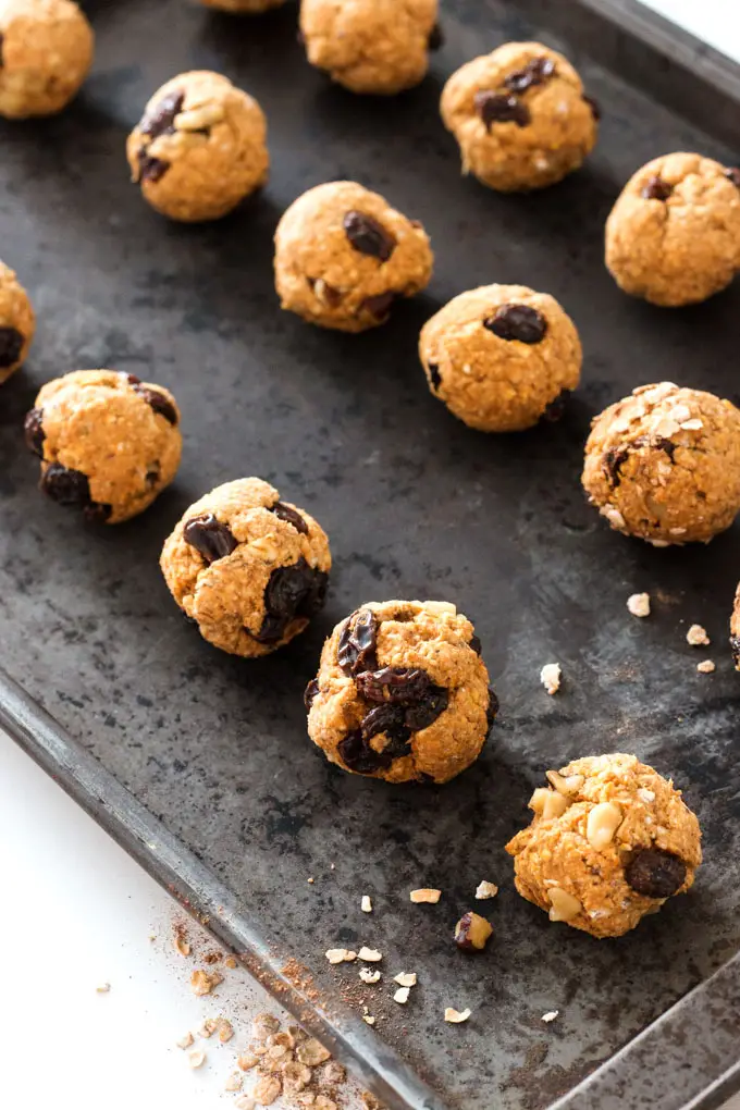 Easy to make vegan pumpkin raisin oatmeal protein bites. Omit the optional walnuts for the perfect lunch box addition.