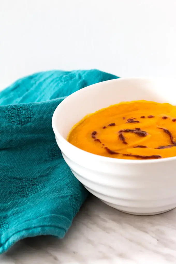 Use up those holiday leftovers and make this easy, tasty butternut squash carrot soup in your blender. Vegan, Paleo and Whole 30 compliant.