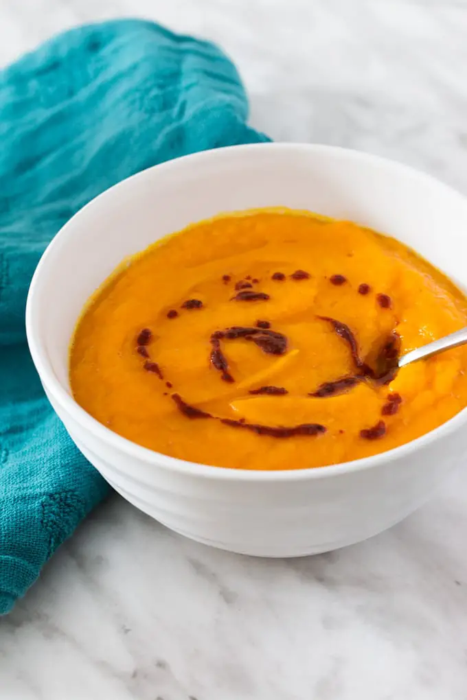 soup in white bowl with spoon