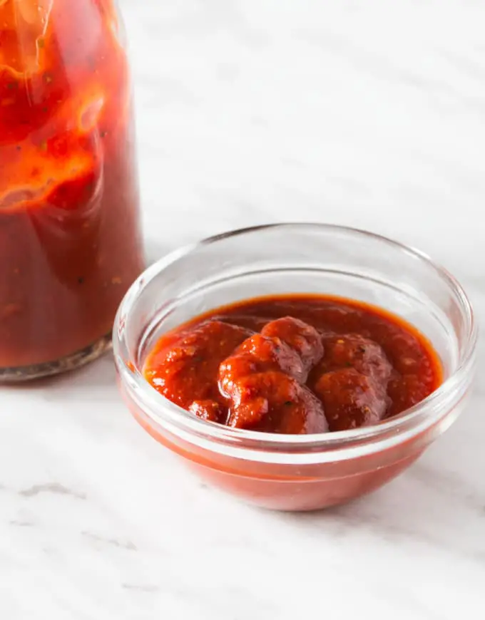 Closeup of ketchup in glass dipping bowl