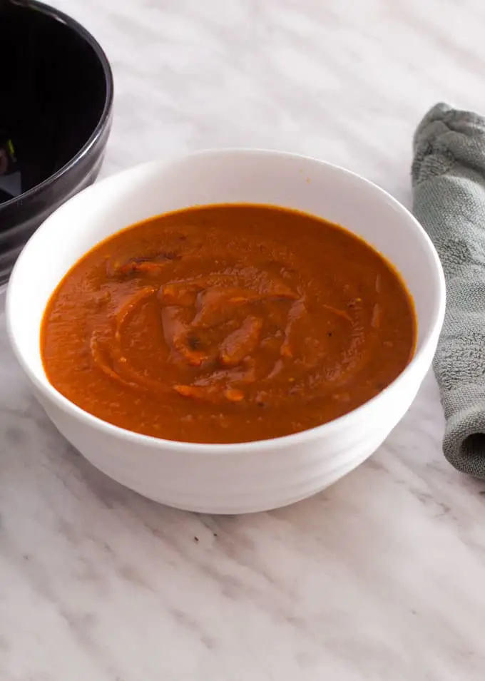 Easy, tasty Spicy Sweet Potato soup is the perfect comfort food for cold winter days. Whole30 and Paleo friendly.