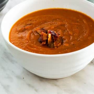 Easy, tasty Spicy Sweet Potato soup is the perfect comfort food for cold winter days. Whole30 and Paleo friendly.