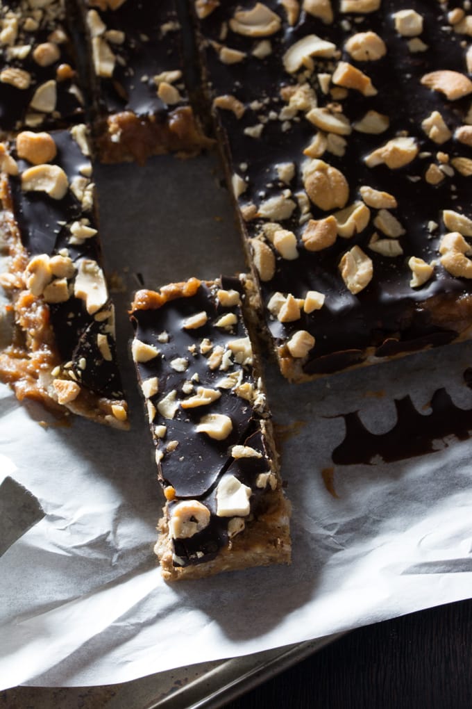 Chocolate Cashew Caramel Protein Bars are delicious and easy to make at home. Gluten Free, Dairy free and many swap options.