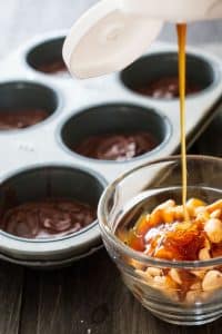 Chocolate Peanut Butter Caramel Ice Cream Cups starts with delicious, creamy 4-ingredient nice cream and ends topped with caramel sauce and peanuts.