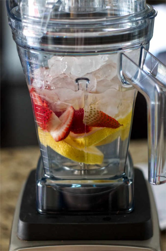 Quick and Easy Strawberry Lemonade made with the Vitamix Aer Disc Container.