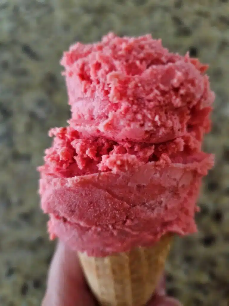 https://blenderhappy.com/wp-content/uploads/2023/10/Ninja-Creami-Strawberry-ice-cream-in-a-waffle-cone--768x1024.jpg.webp
