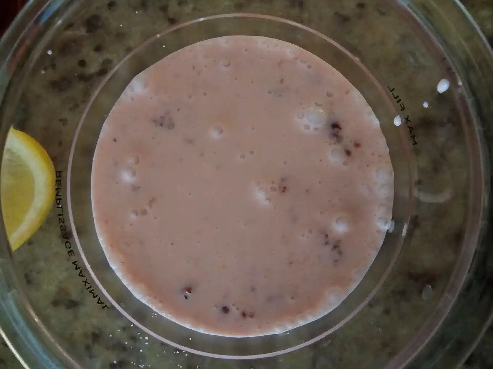 strawberry ice cream mixture in container